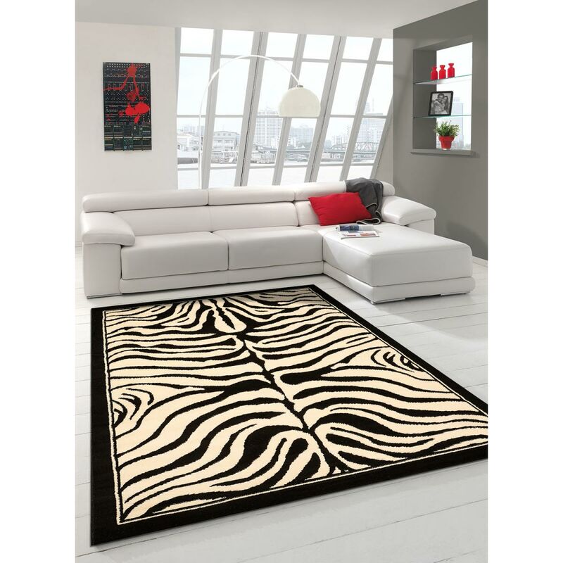 Alfombra diseño moderno cebra del salón de pelo Ras - Pequeño Alfombra de estar Negro 80x150 cm - Noir - Unamourdetapis
Alfombra diseño moderno cebra del salón de pelo Ras - Pequeño Alfombra de estar Negro 80x150 cm - Noir - Unamourdetapis