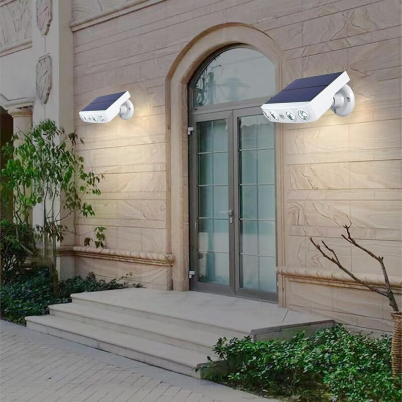 2PCS Lampes solaires d'extérieur, projecteurs à détecteur de mouvement avec conception de caméra de sécurité factice(lumière chaude)