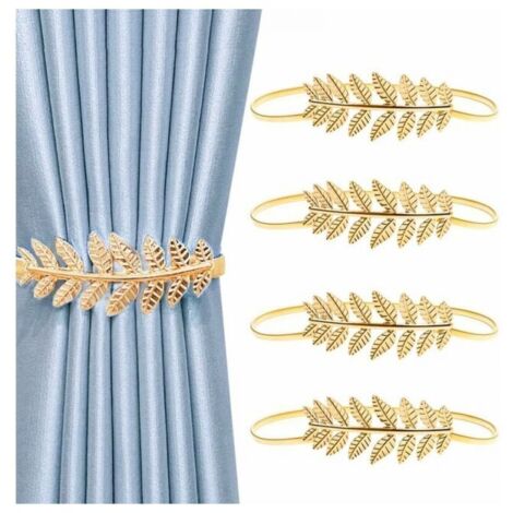 Abrazaderas metálicas para cortinas, accesorios y hebillas doradas.