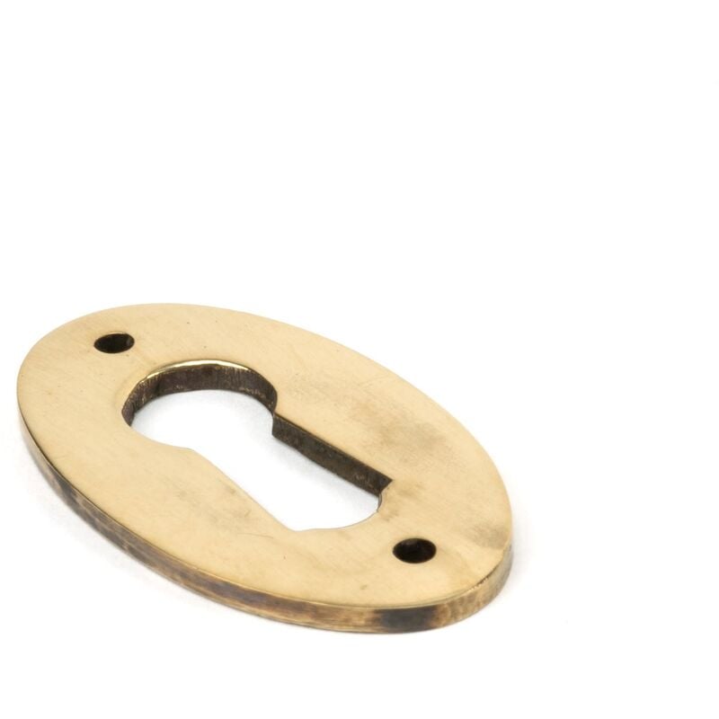 From The Anvil - Aged Brass Oval Escutcheon