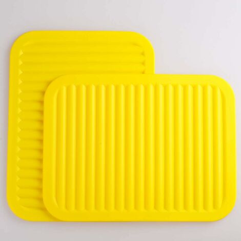AIDUCHO Dessous de plat en silicone pour plats chauds et marmites, coussins chauffants pour plans de travail, tables, porte-pots, repose-cuillère, petits tapis de séchage, ensemble 2 pièces jaune