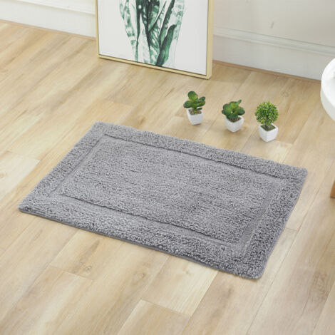 Alfombra de baño gris con ribete