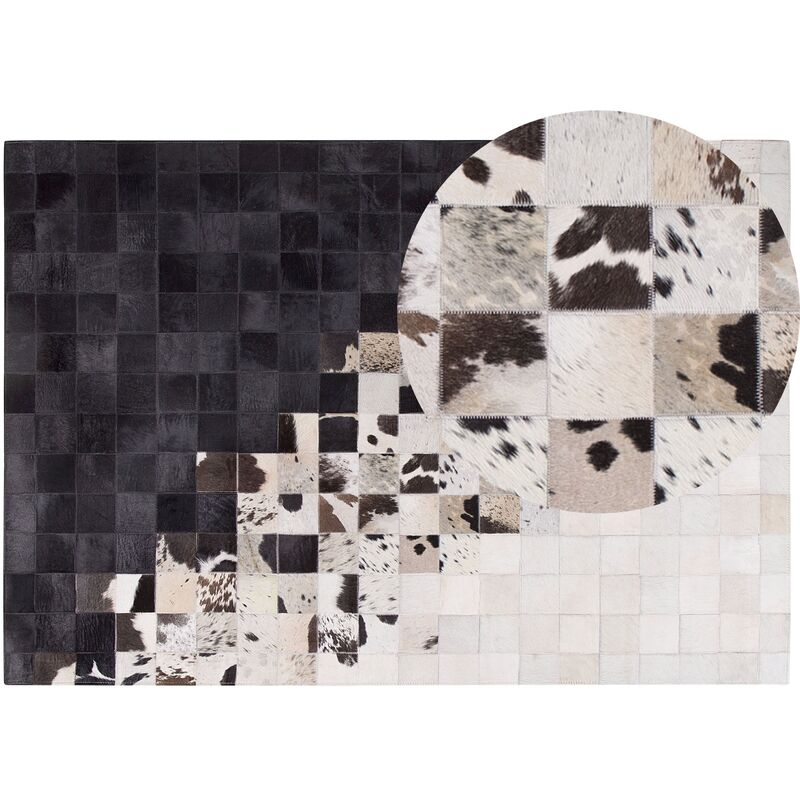 

Beliani - Alfombra de piel blanca/negra 160x230 cm KEMAH
