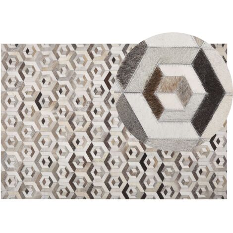 Alfombra de piel de vacuno beige y marrón rectangular 140 x 200 cm patchwork patrón geométrico retro Tavak