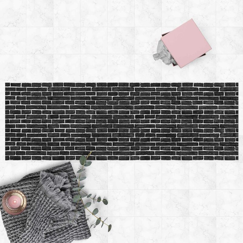

Alfombras vinílicas - Brick Wall Black - Panorama Formato apaisado Dimensión LxA: 60cm x 180cm