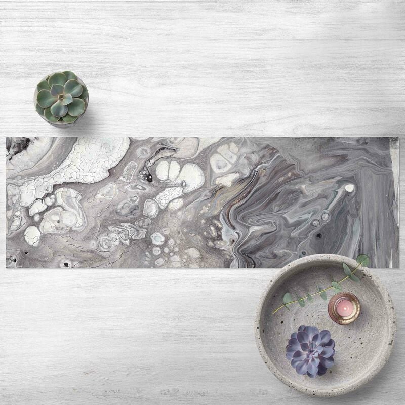 

Alfombras vinílicas - Melting Rock I - Panorama Formato apaisado Dimensión LxA: 30cm x 90cm