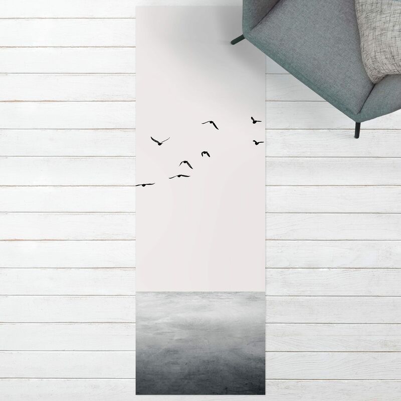 

Alfombras vinílicas - Birds Migrating South - Panorámico Dimensión LxA: 180cm x 60cm
