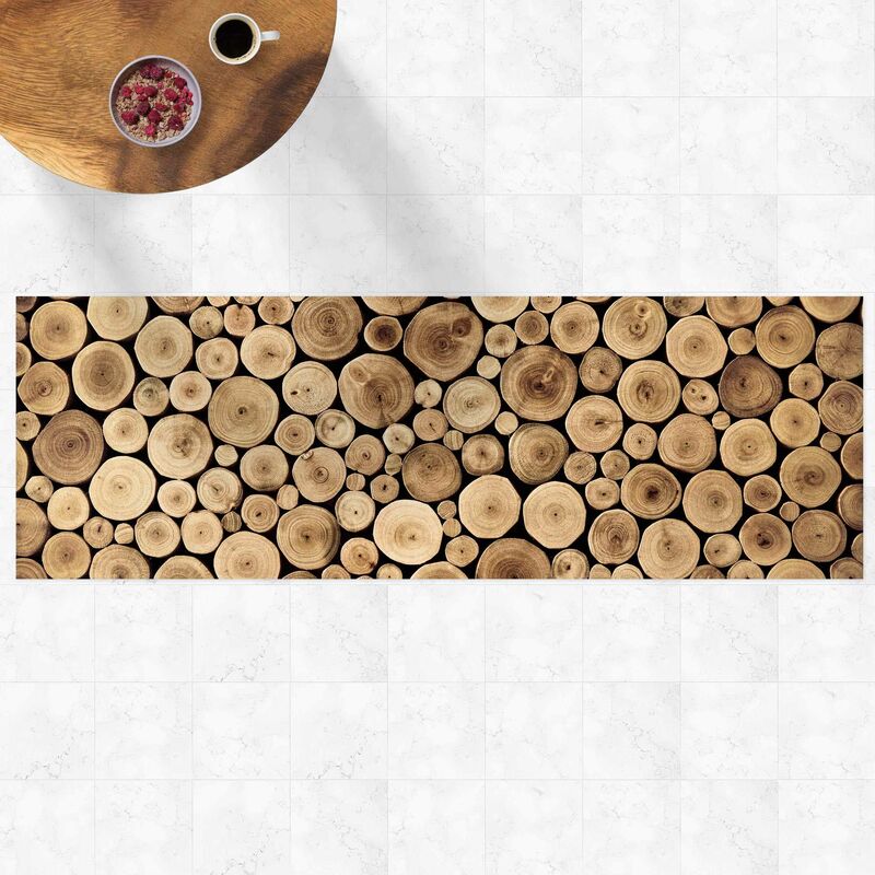 

Alfombras vinílicas - Homey Firewood - Panorama Formato apaisado Dimensión LxA: 30cm x 90cm