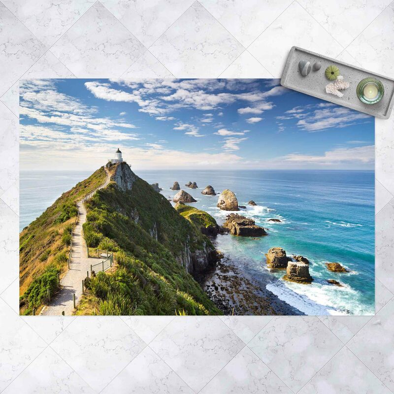 

Alfombras vinílicas - Nugget Point Lighthouse And Sea New Zealand - Apaisado 2:3 Dimensión LxA: 140cm x 210cm