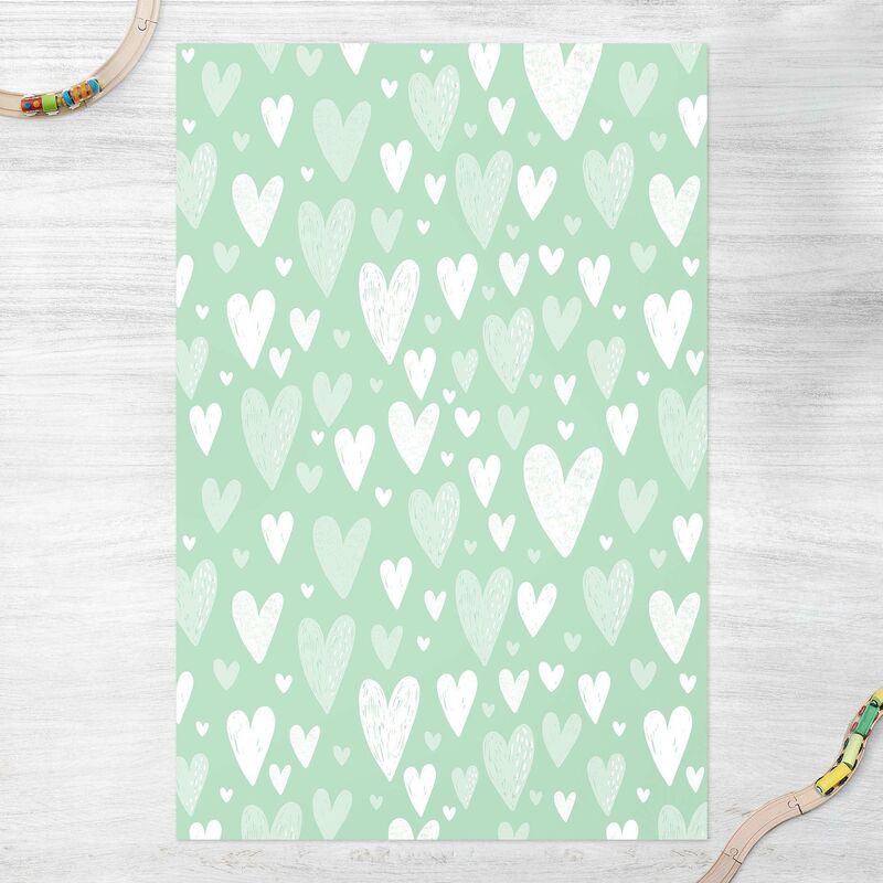 

Alfombras vinílicas - Small And Big Drawn White Hearts On Green - Alto 3:2 Dimensión LxA: 120cm x 80cm