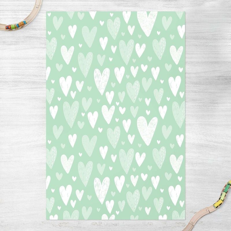 

Alfombras vinílicas - Small And Big Drawn White Hearts On Green - Alto 3:2 Dimensión LxA: 60cm x 40cm