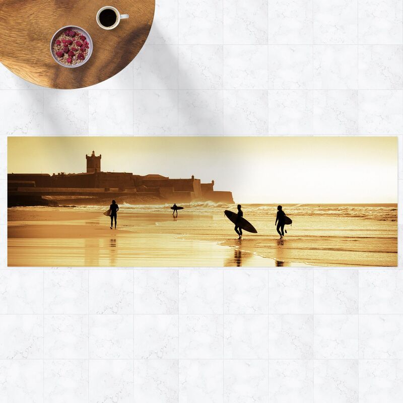 

Alfombras vinílicas - Surfer Beach - Panorama Formato apaisado Dimensión LxA: 40cm x 120cm