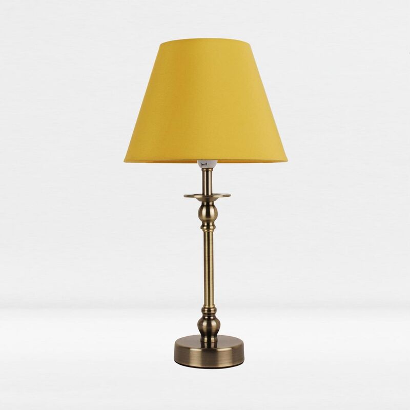 Antique Brass Plated Bedside Table Light with Detailed Column and Ochre Fabric Shade