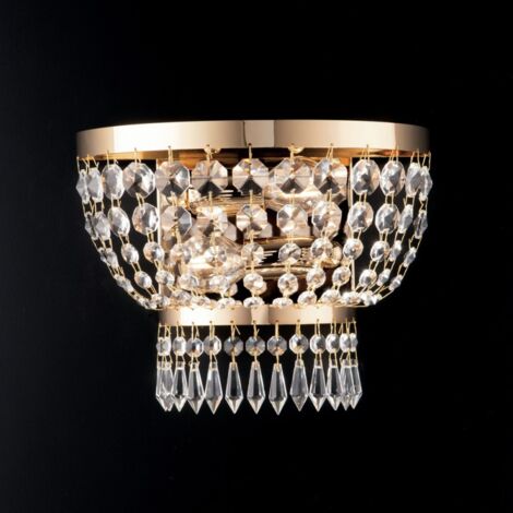 Aplique imperial de hierro y latón dorado con dos luces 27x h22 cm