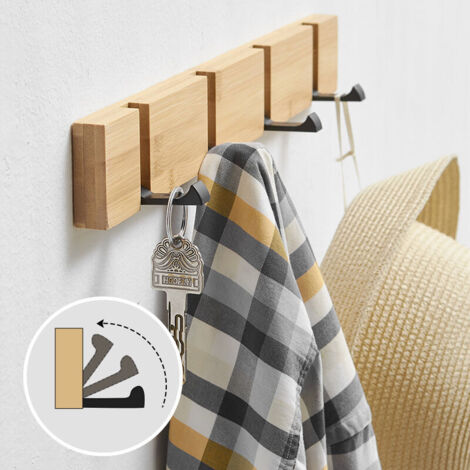 Appendiabiti a parete con 4 ganci retrattili, ideale per appendere cappotti, sciarpe, borse e altri accessori, in colore naturale.