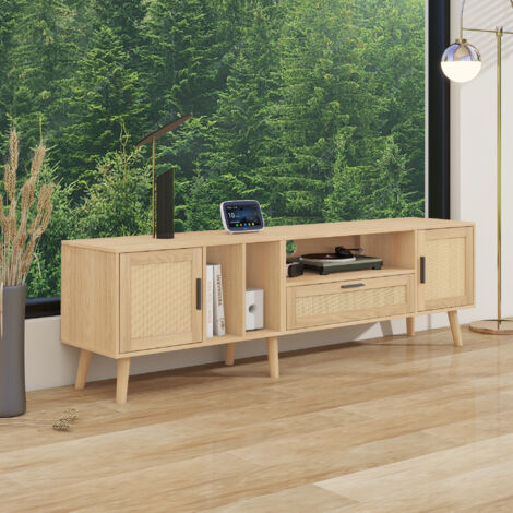 Armoire de télévision spacieuse, mesurant 180 cm de long. Elle est décorée avec du rotin. Elle comporte deux portes et un tiroir. Ses pieds sont faits de bois massif.
