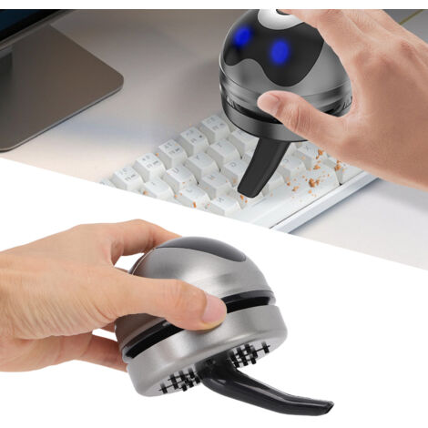Aspiradora de mesa USB recargable de color gris, compacta y silenciosa, para polvo, migas, suciedad y pelo de mascotas.