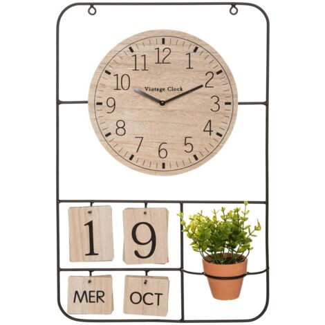 Atmosphera – Pendule murale ronde en métal et bois avec calendrier perpétuel – Dimensions L. 34 x P. 12 x H. 51,8 cm – Plante verte artificielle