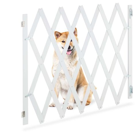 Barriera per cani retrattile di colore bianco