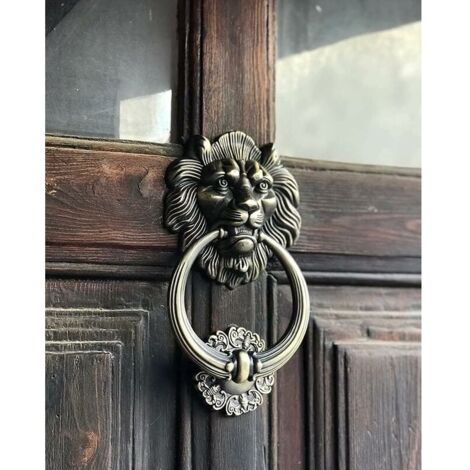 Batacchio a forma di testa di leone, bronzo
