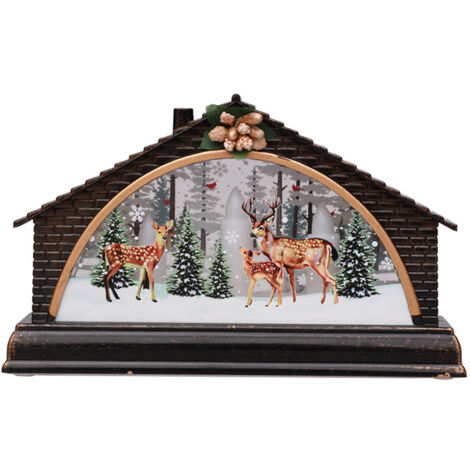 Beleuchtetes Weihnachtshaus mit Krippenszene und Schnee - Festliche Dorfdekoration für den Innenbereich