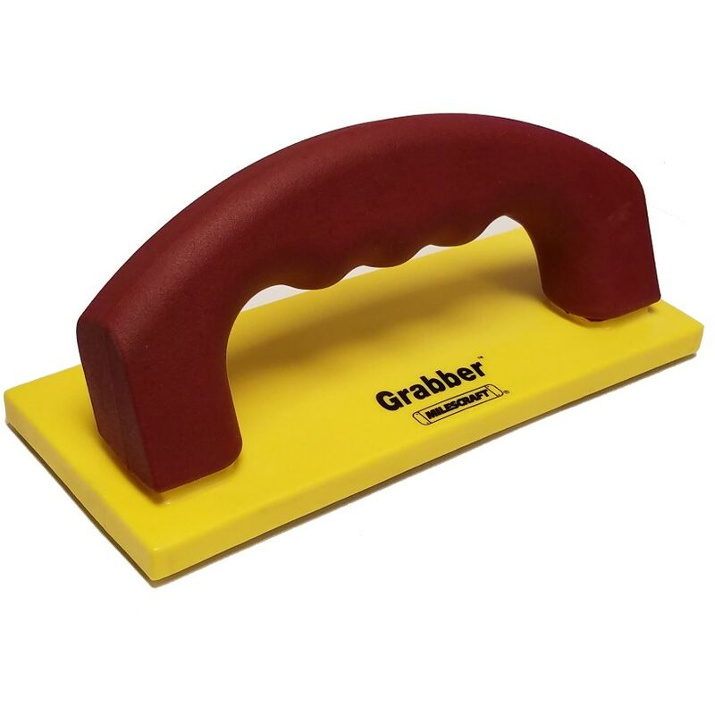 Blocco di spinta versatile per segare o fresare