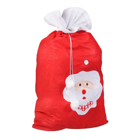 Bolsa de regalos de Santa Claus debajo del árbol de Navidad