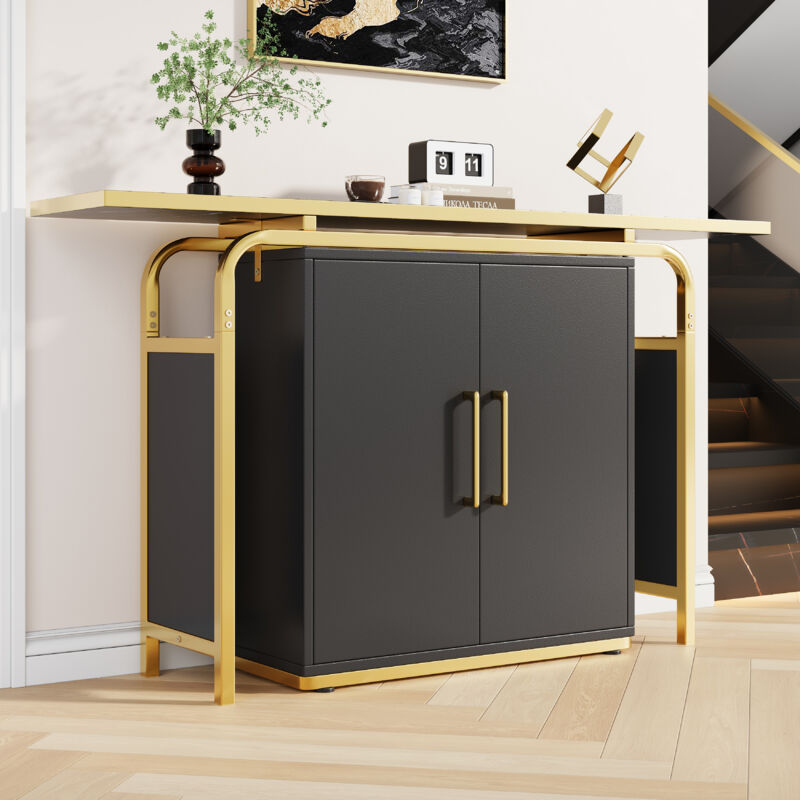 Buffet noir à deux portes avec un table en cadre dorées, noir et or, 140x29,5x80 cm