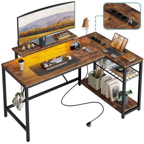 Bureau d'angle en L Bestier 132 cm avec prises et éclairage LED, réversible, avec étagères, grand poste de travail pour ordinateur et crochets, idéal pour le bureau à domicile et la chambre.