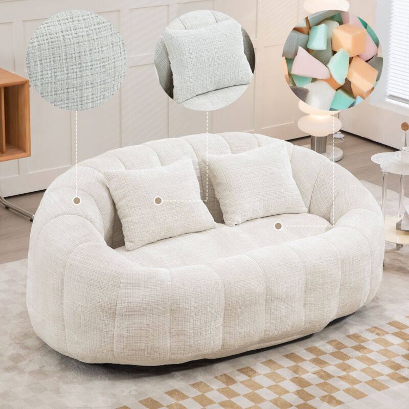 Canapé avec coussins poire — léger et résistant, assise haute. Fauteuil lounge confortable en tissu beige.