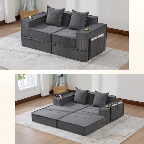 Ce canapé-lit deux places moderne est doté d'une assise confortable en tissu et de deux coussins. Un élégant repose-pieds décoratif avec rangement latéral et porte-gobelet le rend idéal pour les