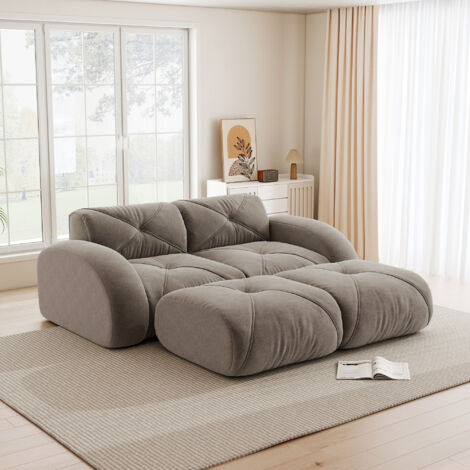 Ce canapé modulable 2 places est livré avec deux poufs. Sans structure, il convient aux salons et aux appartements. Antidérapant et livré monté. Couleur : marron.