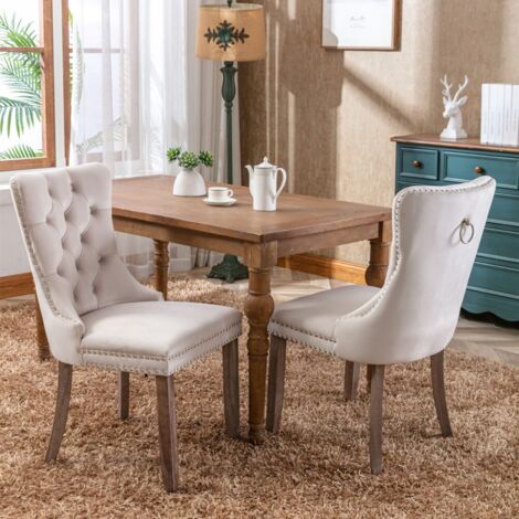 Chaise salle à manger contemporaine rembourrée velours avec pieds bois et détails tête de clou, confortable pour repas, pack de 2, couleur beige.