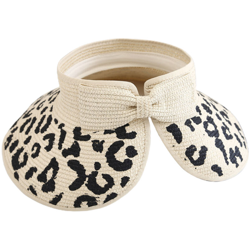 Chapeau de soleil à large bord imprimé léopard avec nœud papillon, protection UV, pliable et trou pour queue de cheval, idéal pour plage et voyage.