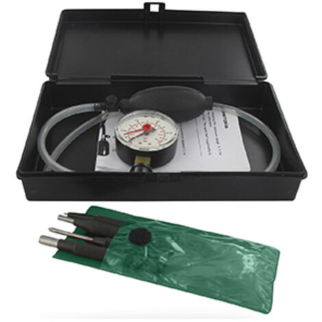 coffret de contrôle d'étanchéité avec manomètre et outillage pour carburateurs.