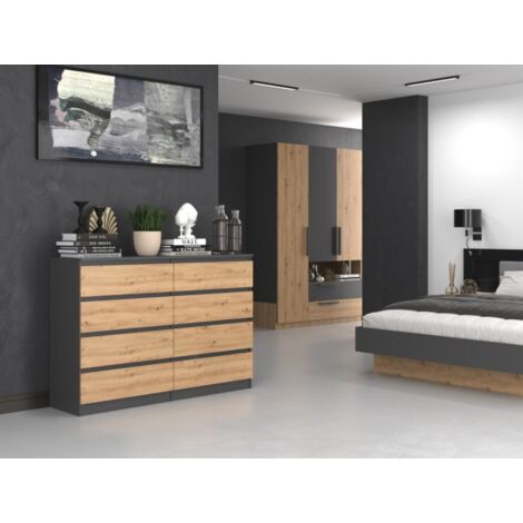 Commode Malwa 140 cm – 4 tiroirs – Corps en panneaux de particules laminés – Finition en plastique ABS – Design minimaliste anthracite