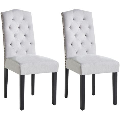 BELIANI Conjunto de 2 sillas de comedor tapizadas en terciopelo gris diseño retro moderno patas de madera negras Shirley