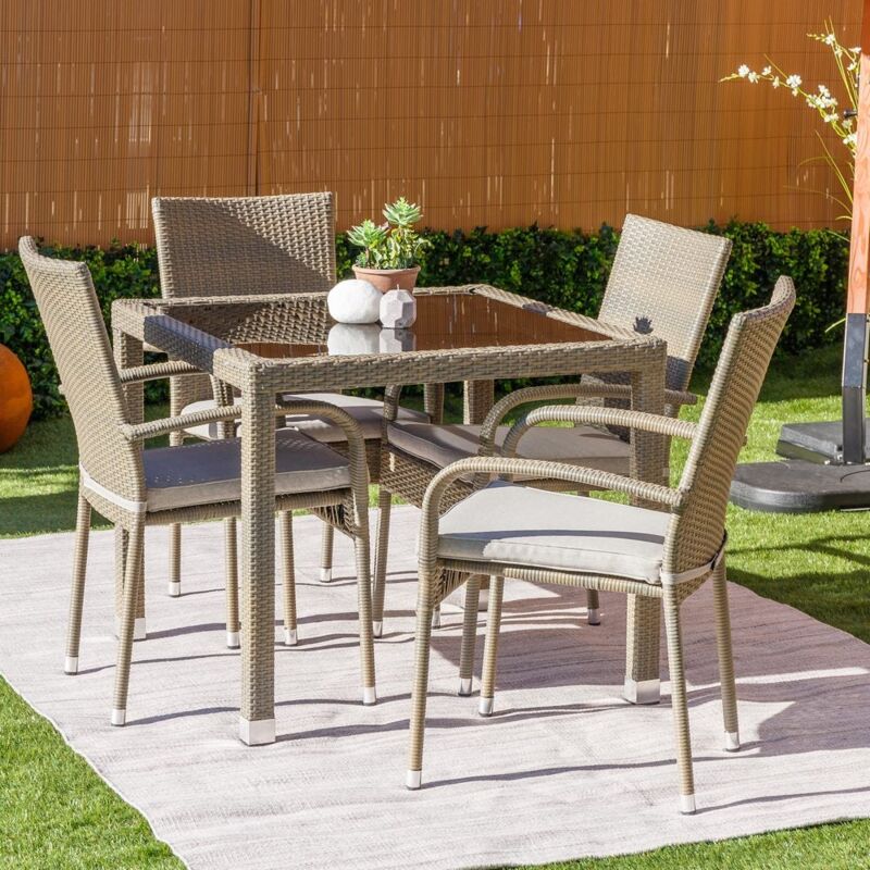 

Conjunto de mesa y sillas de jardín Marlene de cristal y rattán sintético topo