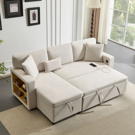 Corner sofa with sleeping function – L-shaped, pull-out sleeper sofa with storage compartment and integrated shelf, beige.