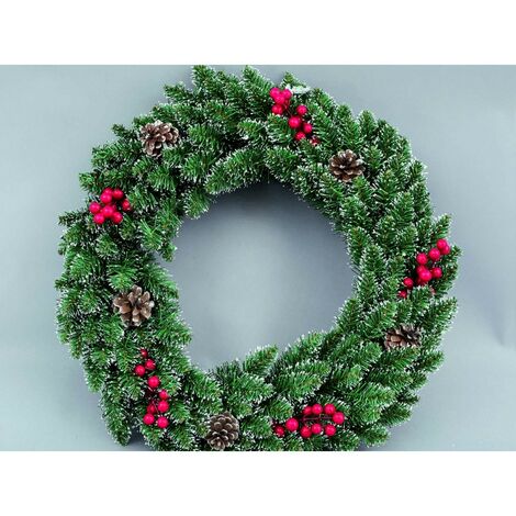 Couronne de Noël verte derrière la porte avec des pommes de pin 50 cm