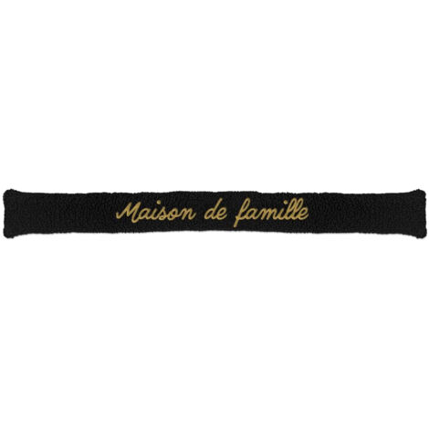 Coussin bas de porte moutonneux brodé
