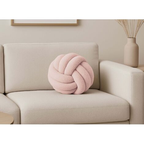 Coussin rond décoratif boule de nœud en effet peau de mouton rose
