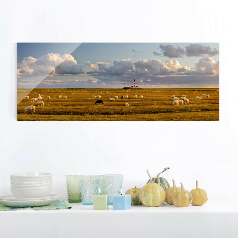 

Cuadro de cristal - North Sea Lighthouse with sheep flock - Panorama Apaisado Dimensión LxA: 20cm x 55cm