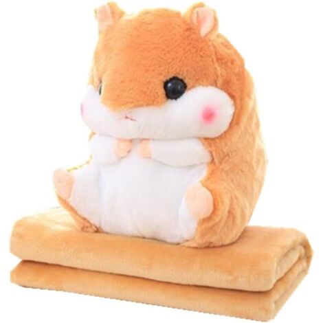 Der entzückende Hamster hatte sein Kissen und seine weiche Decke darin versteckt die Decke war hellkorallenbraun.