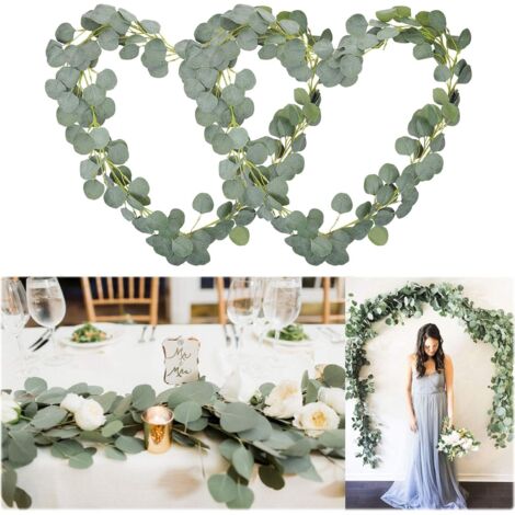 Deux lianes d'eucalyptus à feuilles rondes, décorées de feuilles et de vrilles d'eucalyptus artificielles.