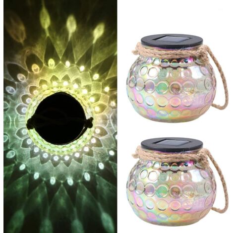 Deux veilleuses en bocaux de verre à énergie solaire, idéales pour la décoration.