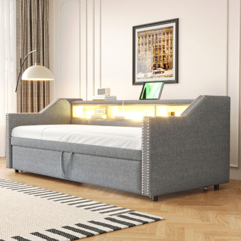 Divano letto imbottito in tessuto grigio chiaro 90/180x190 cm con letto estraibile, LED, USB, rete e 2 materassi