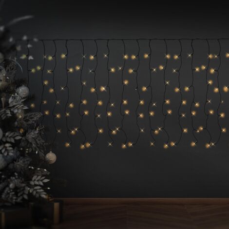 Tenda oscurante per finestre Brillantemente illuminato albero di Natale con  un sacco di regali 