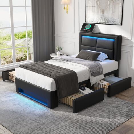 Einzelbett 90 x 200 cm, bezogen mit PU-Leder, mit ausziehbaren USB-Anschlüssen und LED-Beleuchtung, schwarz. Matratze nicht im Lieferumfang enthalten.