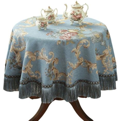 Elegante tovaglia con motivo jacquard e frange, realizzata con materiali riciclati.